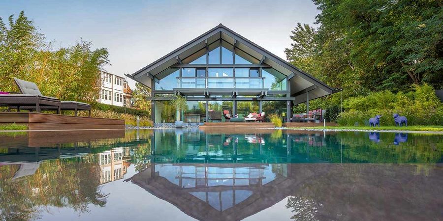 HUF HAUS GmbH & Co. KGmodernes Fachwerkhaus aus Holz HUF HAUS GmbH & Co. KGmodernes Fachwerkhaus aus Holz