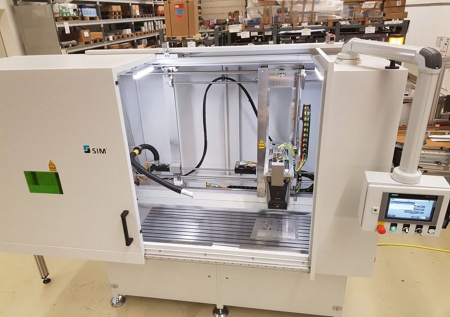 SIM Automation System mit Beladung von oben SIM Automation System mit Beladung von oben