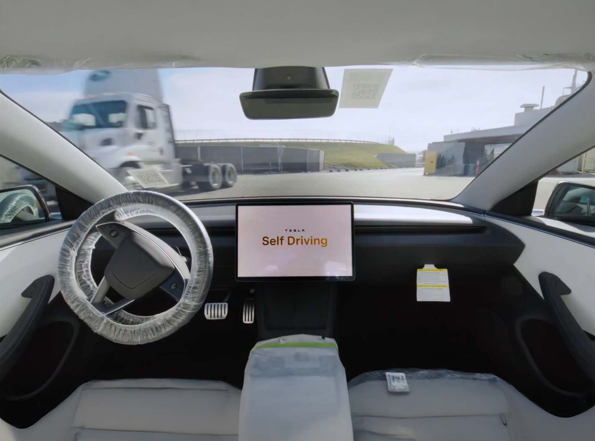 Teslas Full Self-Driving in der Logistik mit KI und digitalen Zwillingen